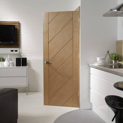Wooden door with geometric design in a modern kitchen setting