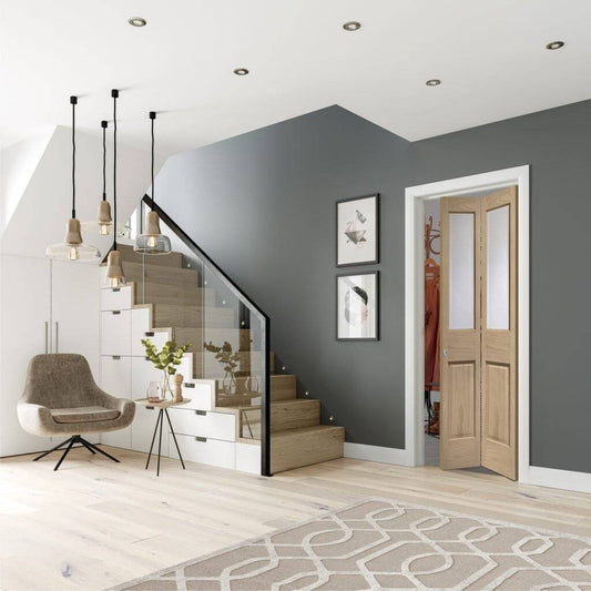 Modern interior design of a living room with gray walls, wooden staircase, and decorative elements.