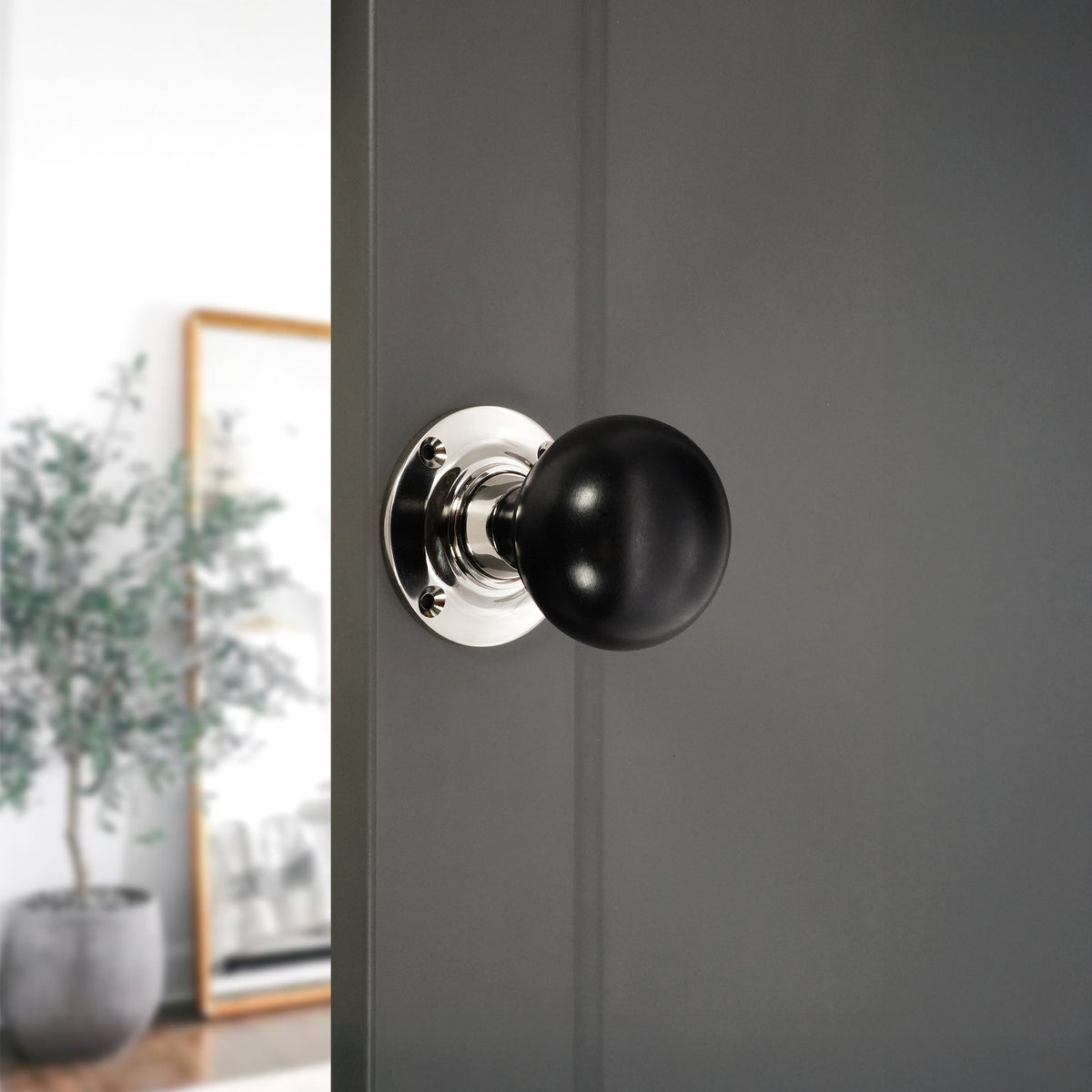 Ebony Bun Rim/Mortice Door Knob Polished Nickel